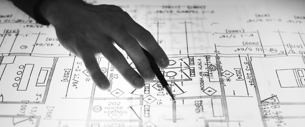 A hand writing scientific data